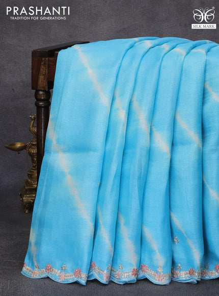 Pure tussar silk saree light blue with tie & dye prints embroidery work buttas and embroidery work border