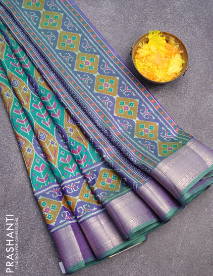 Semi tussar saree teal blue and dual shade of violet with allover ikat weaves and zari woven border