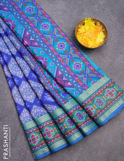 Semi tussar saree blue and teal blue shade with allover ikat weaves and zari woven border