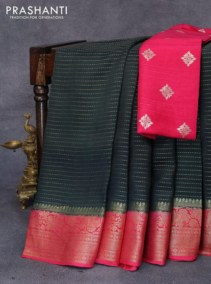 Dola silk saree bottle green and pink with allover zari stripe weaves and zari woven border & zari butta blouse