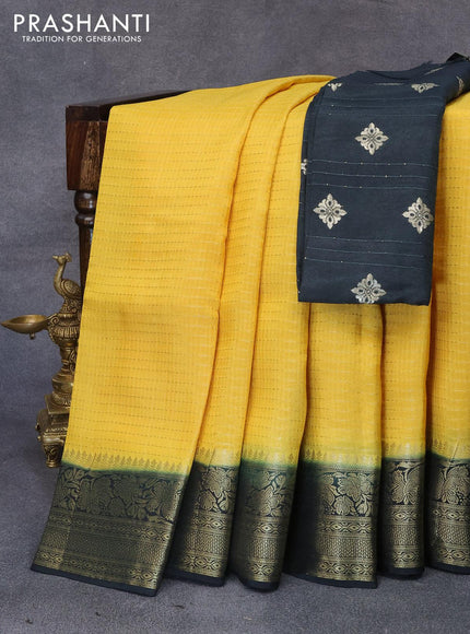 Dola silk saree yellow and bottle green with allover zari stripe weaves and zari woven border & zari butta blouse