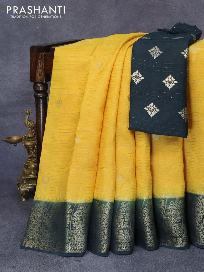 Dola silk saree yellow and dark green with allover zari stripes & butta weaves and zari woven border & zari butta blouse