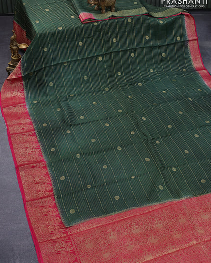 Dola silk saree dark green and pink with allover zari stripes & butta weaves and zari woven border & zari butta blouse