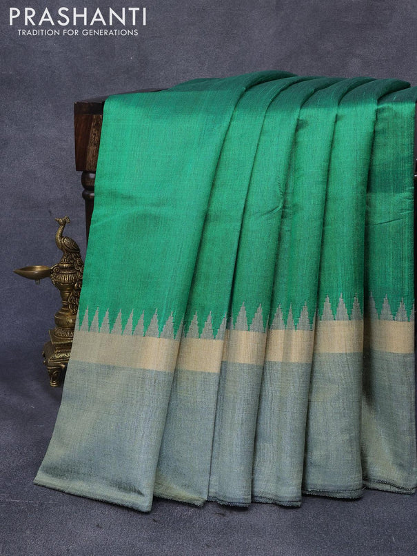 Dupion silk saree green and green shade with plain body and temple design zari woven simple border