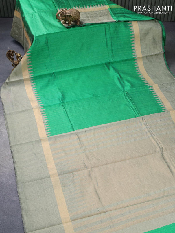 Dupion silk saree green and green shade with plain body and temple design zari woven simple border