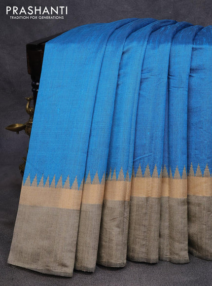 Dupion silk saree cs blue and beige with plain body and long temple design zari woven simple border