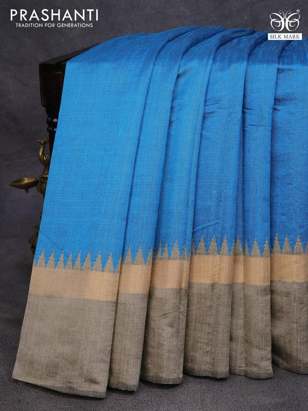 Dupion silk saree cs blue and beige with plain body and long temple design zari woven simple border