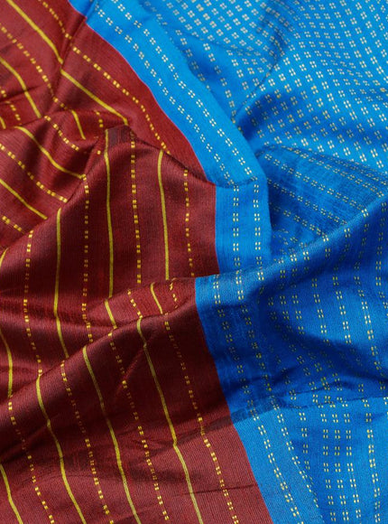 Dupion silk saree maroon and cs blue with allover thread weaves and temple design woven border