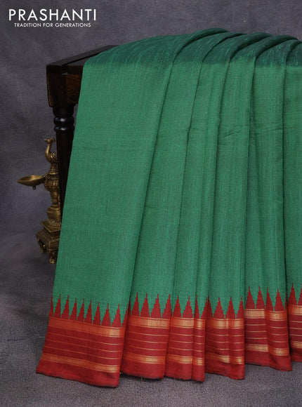 Dupion silk saree green and maroon with plain body and temple design zari woven border