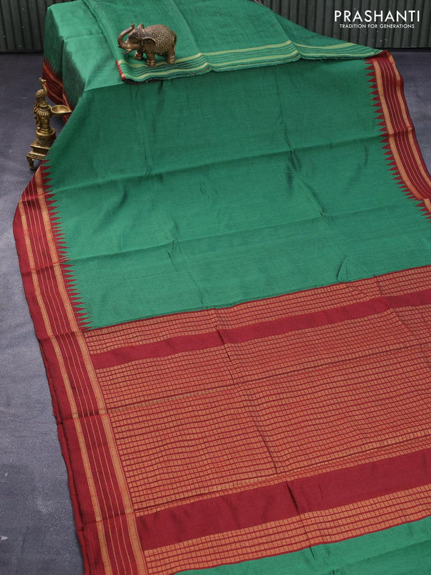 Dupion silk saree green and maroon with plain body and temple design zari woven border