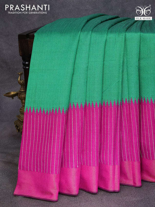 Dupion silk saree green and magenta pink with plain body and temple design thread woven zari border