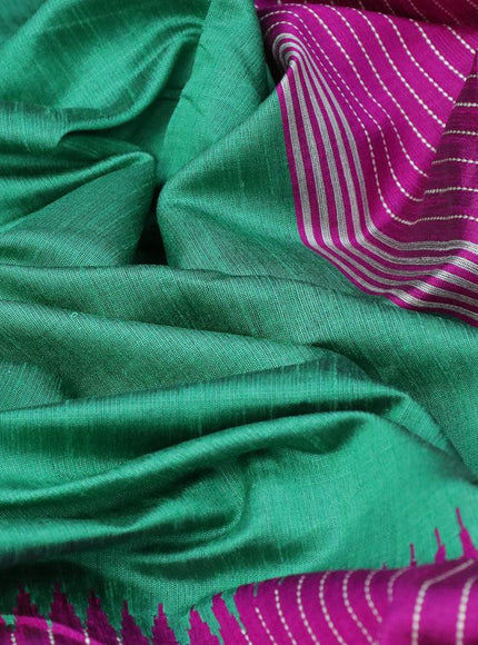 Dupion silk saree green and magenta pink with plain body and temple design thread woven zari border