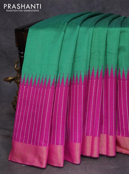 Dupion silk saree green and magenta pink with plain body and temple design thread woven zari border