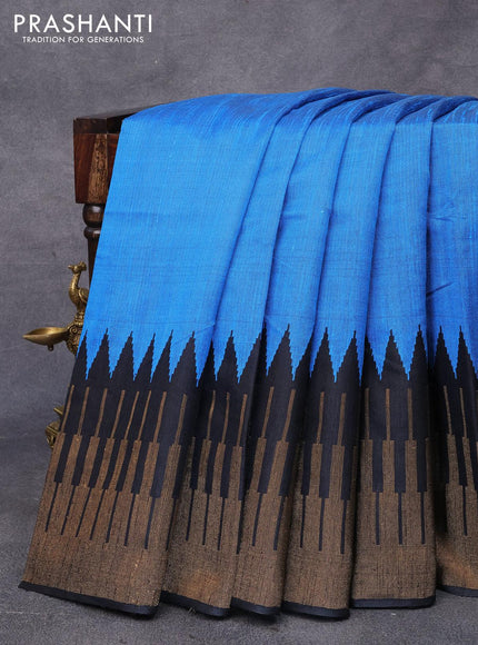 Dupion silk saree cs blue and black with plain body and temple design zari woven border