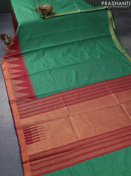 Dupion silk saree green and maroon with plain body and temple design zari woven border