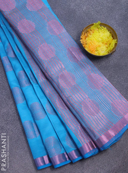 Semi raw silk saree cs blue with allover pink zari woven buttas and small pink zari woven border