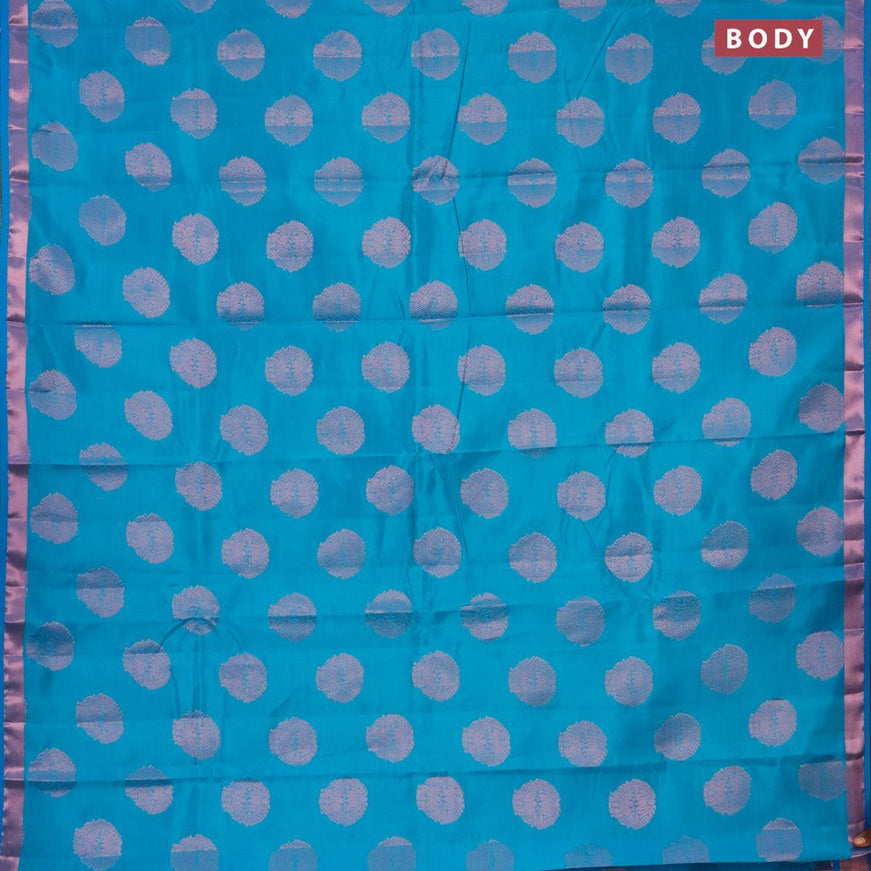 Semi raw silk saree cs blue with allover pink zari woven buttas and small pink zari woven border