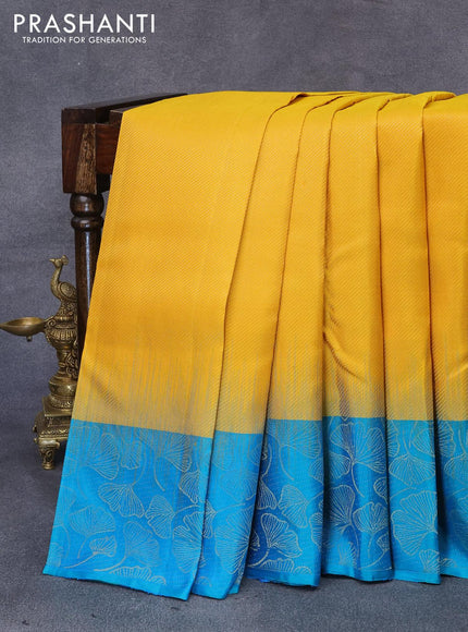 Pure soft silk saree yellow and dual shade of teal bluish green with allover zari weaves and leaf design zari woven border