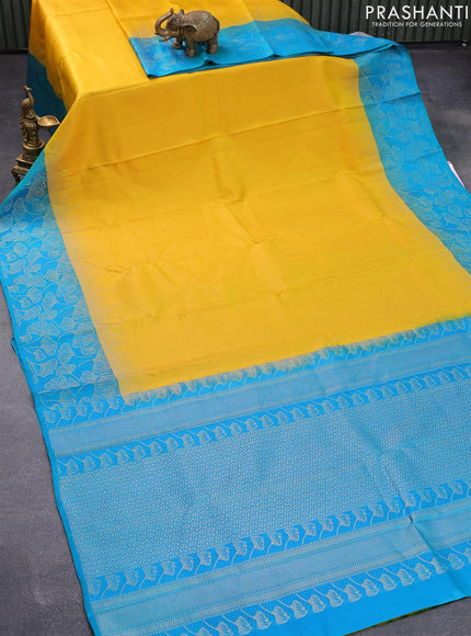 Pure soft silk saree yellow and dual shade of teal bluish green with allover zari weaves and leaf design zari woven border