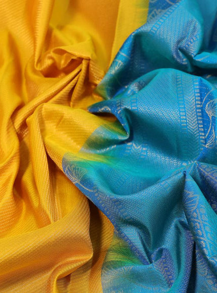 Pure soft silk saree yellow and dual shade of teal bluish green with allover zari weaves and leaf design zari woven border