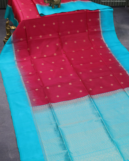Pure soft silk saree reddish pink and teal blue with zari woven floral buttas and zari woven simple border