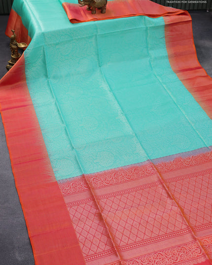 Pure soft silk saree teal green and dual shade of pinkish orange with allover silver zari woven broacde weaves and zari woven border
