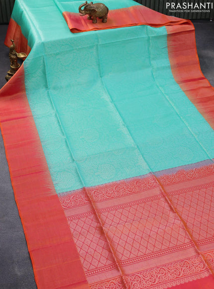 Pure soft silk saree teal green and dual shade of pinkish orange with allover silver zari woven broacde weaves and zari woven border