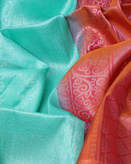 Pure soft silk saree teal green and dual shade of pinkish orange with allover silver zari woven broacde weaves and zari woven border