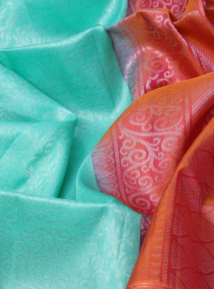 Pure soft silk saree teal green and dual shade of pinkish orange with allover silver zari woven broacde weaves and zari woven border