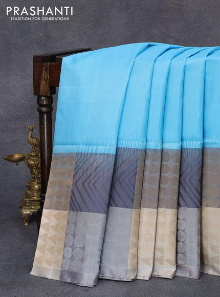 Pure soft silk saree light blue and multi colour with plain body and long zari woven border