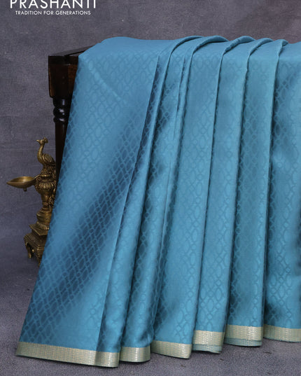Pure mysore silk saree pastel shade of blue with allover self emboss and zari woven border