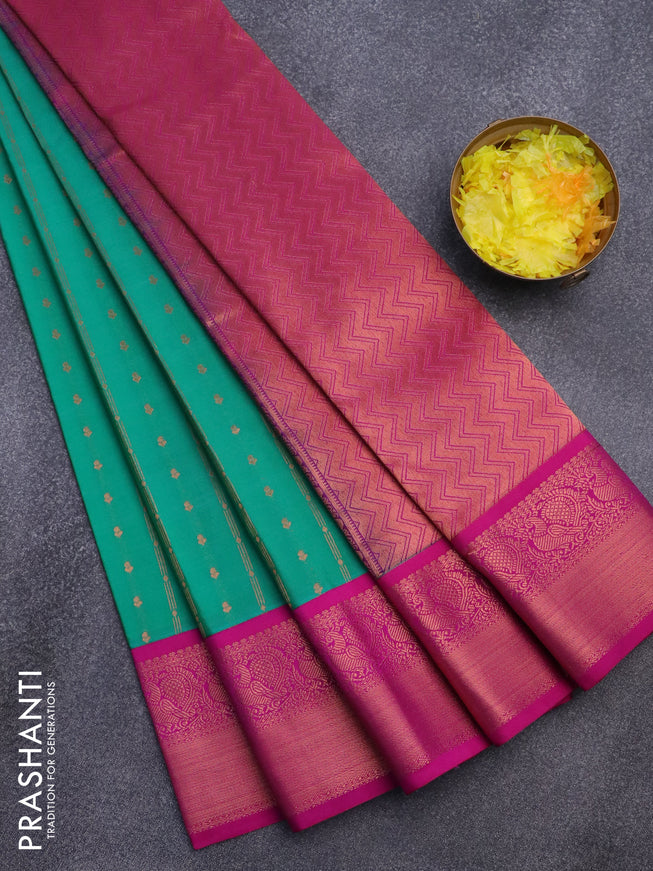 Semi kanjivaram silk saree teal green and magenta pink with allover zari weaves and copper zari woven korvai border
