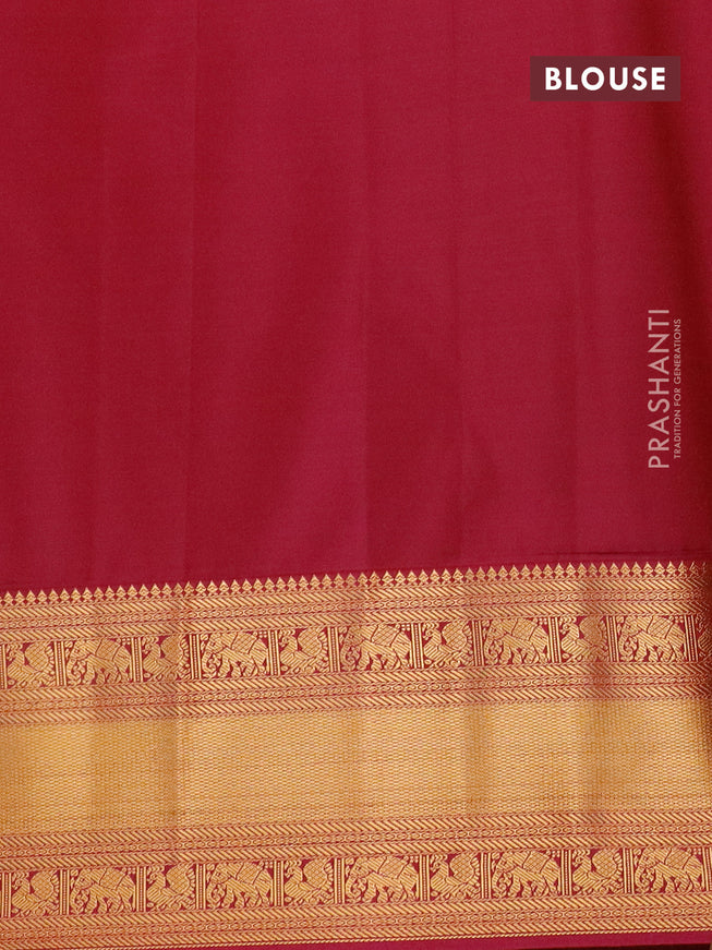 Semi kanjivaram silk saree dark green and magenta pink with zari woven buttas and zari woven korvai border