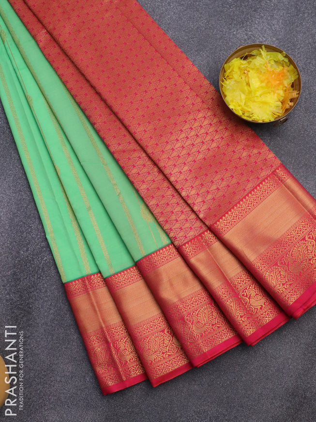 Semi kanjivaram silk saree teal green and dual shade of pink with allover zari weaves and long zari woven korvai border
