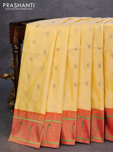 Pure paithani silk saree pale yellow and red with allover paisley zari woven buttas and zari woven paithani butta border