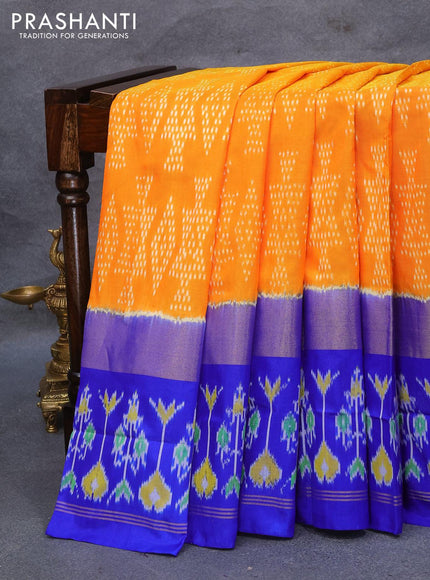 Pochampally silk saree orange and blue with allover ikat weaves and long zari woven ikat style border