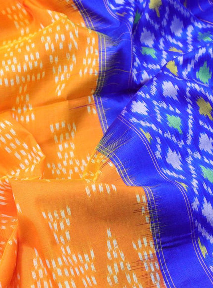 Pochampally silk saree orange and blue with allover ikat weaves and long zari woven ikat style border