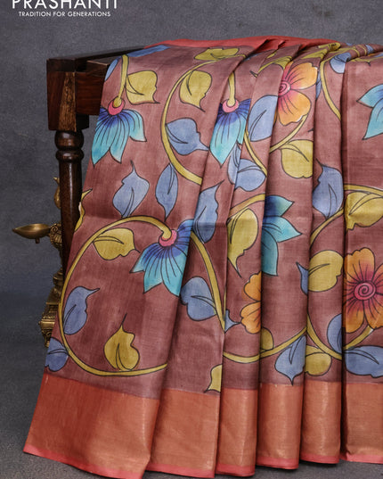 Pure tussar silk saree brown shade and pastel peach with allover floral kalamkari hand painted prints and zari woven border