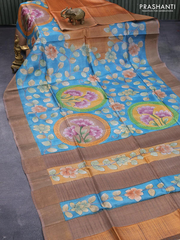 Pure tussar silk saree blue and pastel brown with allover floral kalamkari hand painted prints and zari woven border