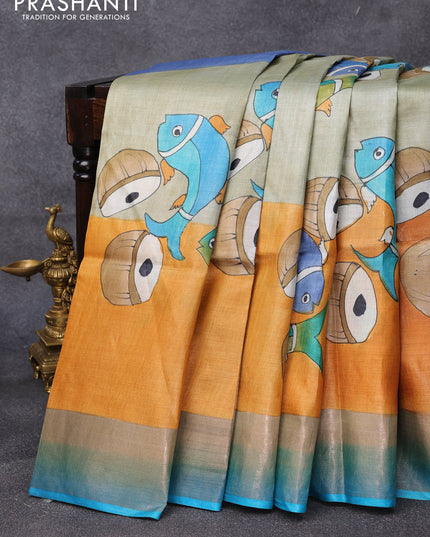 Pure tussar silk saree pastel green shade and orange blue with hand painted prints and zari woven border