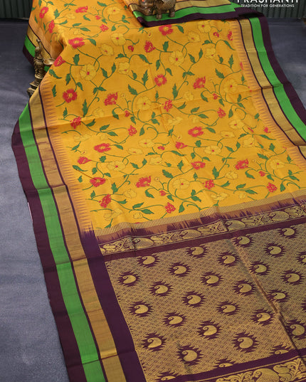 Silk cotton saree mustard yellow and brown with floral prints and temple design zari woven simple border