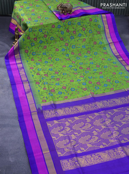 Silk cotton saree light green and blue with floral prints and temple design zari woven simple border