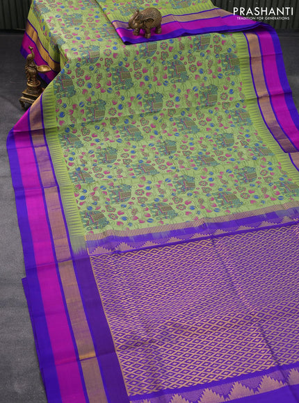 Silk cotton saree light green and blue with allover kalamkari prints and temple design zari woven simple border