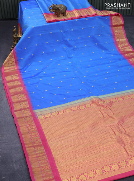 Pure gadwal silk saree blue shade and pink with allover zari woven buttas and temple design zari woven floral border