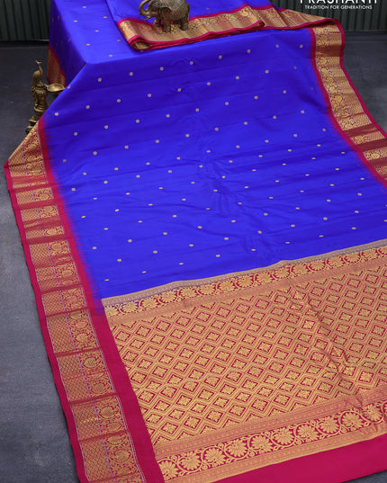 Pure gadwal silk saree blue and dark pink with zari woven buttas and temple design floral zari woven border