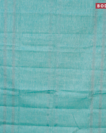 Pure linen saree teal green with plain body and silver zari woven piping border