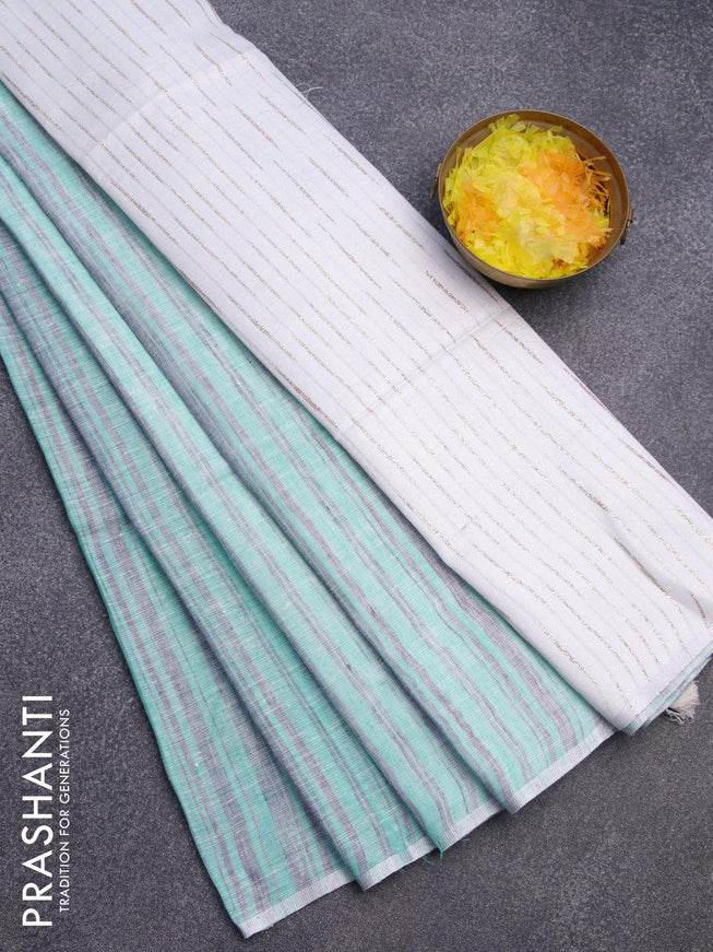 Pure linen saree teal green grey and off white with allover stripe pattern and silver zari woven piping border