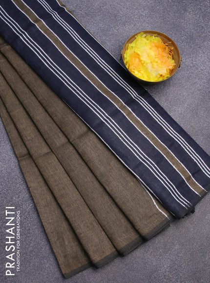 Pure linen saree chikku shade and dark navy blue with plain body and piping border