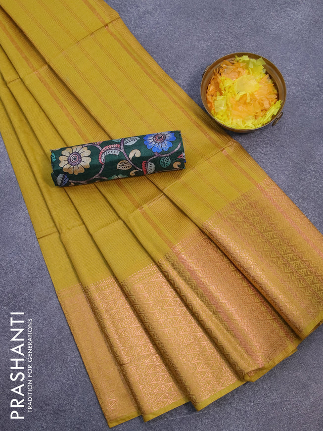 Semi tussar saree yellow and green with plain body and long copper zari woven border & kalamkari printed blouse