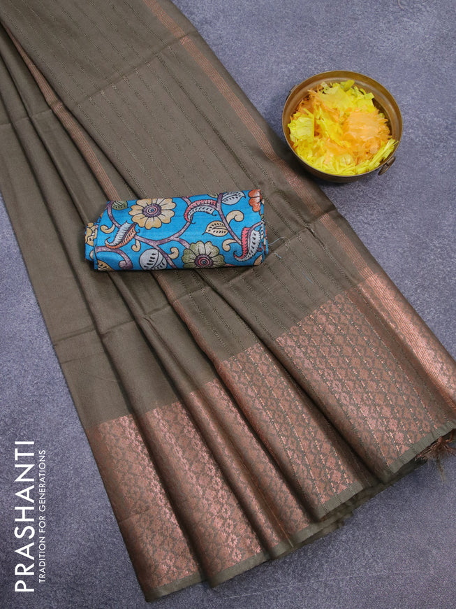 Semi tussar saree military green shade and teal blue with plain body and long copper zari woven border & kalamkari printed blouse